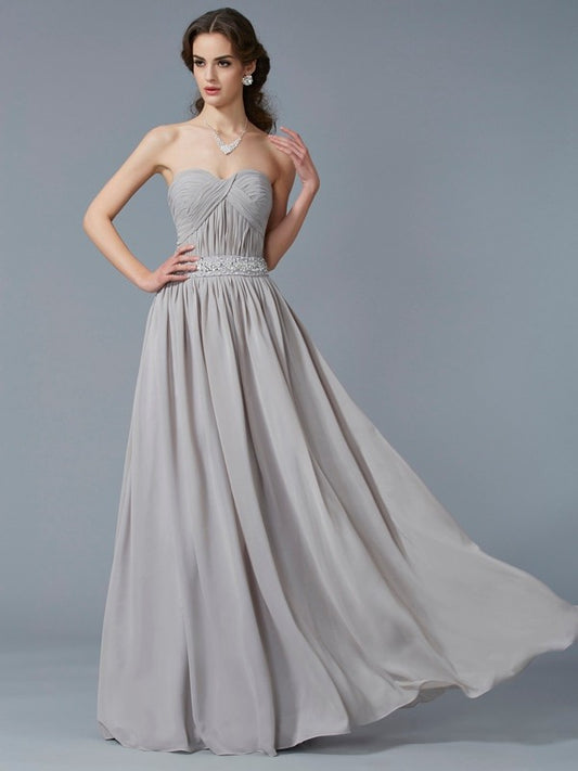 Vestido de noche de graduación de gasa largo con escote corazón, sin mangas y cuentas, corte princesa/corte A