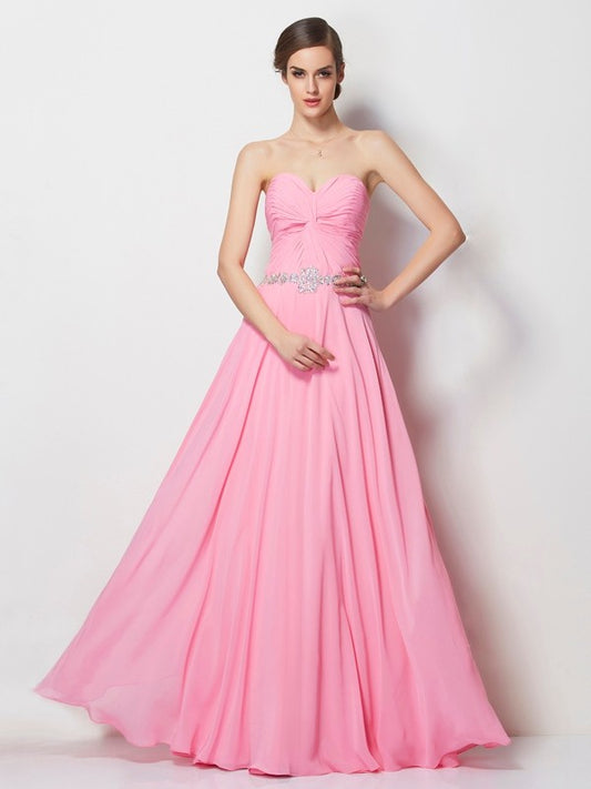 Vestido de noche de graduación de gasa largo con escote corazón, sin mangas y cuentas, corte princesa/corte A