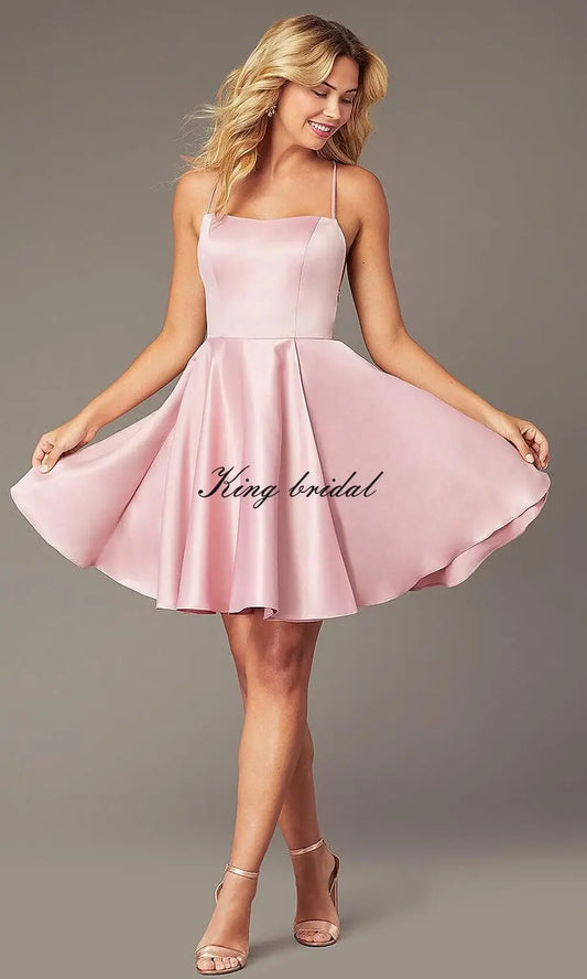 Maßgeschneidertes kurzes Satin-Heimkehrkleid mit Taschen, Spaghettiträgern, formelle Hochzeitsfeierkleider, Cocktail-Clubwear-Kleider