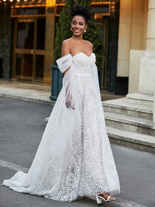 Vestido de novia color marfil con escote corazón, sin mangas, de encaje y corte A.