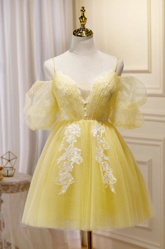 Vestido amarillo con escote pronunciado y hombros descubiertos, con apliques, para fiesta de bienvenida y cóctel.