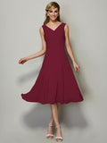 Vestido de dama de honor de gasa, corte A/princesa, escote en V, sin mangas, plisado, corto, para invitada de boda