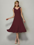 Vestido de dama de honor de gasa, corte A/princesa, escote en V, sin mangas, plisado, corto, para invitada de boda