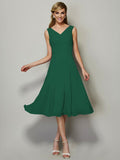 Vestido de dama de honor de gasa, corte A/princesa, escote en V, sin mangas, plisado, corto, para invitada de boda