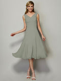 Vestido de dama de honor de gasa, corte A/princesa, escote en V, sin mangas, plisado, corto, para invitada de boda