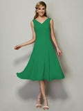 Vestido de dama de honor de gasa, corte A/princesa, escote en V, sin mangas, plisado, corto, para invitada de boda