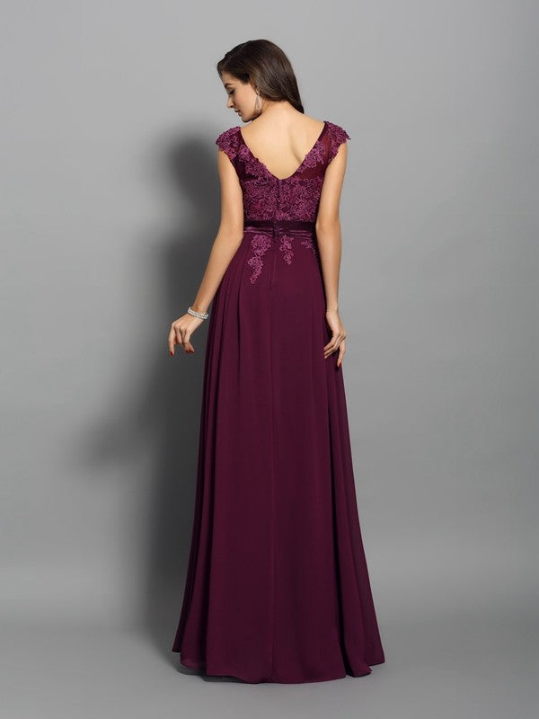 Vestido de noche de graduación de gasa largo sin mangas con apliques redondos y corte A/princesa
