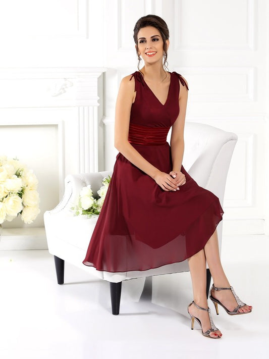 Vestido de dama de honor corto de gasa, sin mangas, con escote en V y corte A/princesa, ideal para invitadas de boda