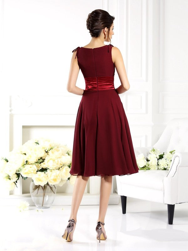 Vestido de dama de honor corto de gasa, sin mangas, con escote en V y corte A/princesa, ideal para invitadas de boda