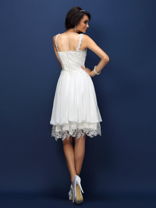 Vestido de dama de honor corto sin mangas con escote en V y encaje de corte A/princesa para regreso a casa