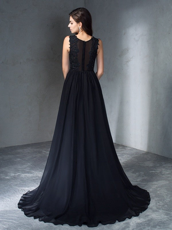 Vestido de noche de graduación de gasa largo sin mangas con apliques redondos y corte A/princesa