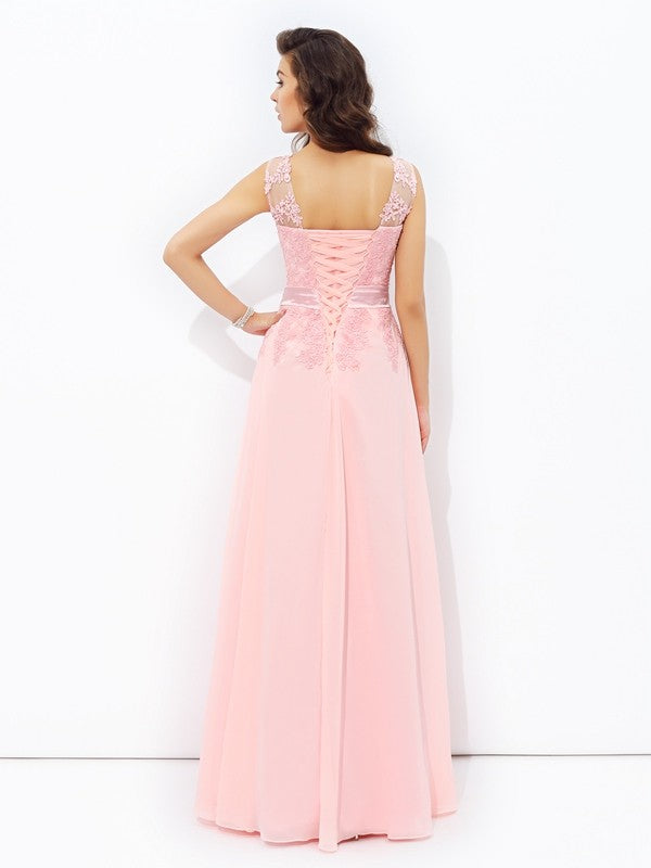 Vestido de noche de graduación de gasa largo sin mangas con apliques redondos y corte A/princesa