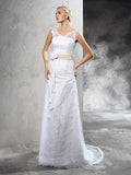 Sheath/Column Sheer Neck Hand-Made Flower Sleeveless Long Satin Wedding Dresses Bridal Gowns