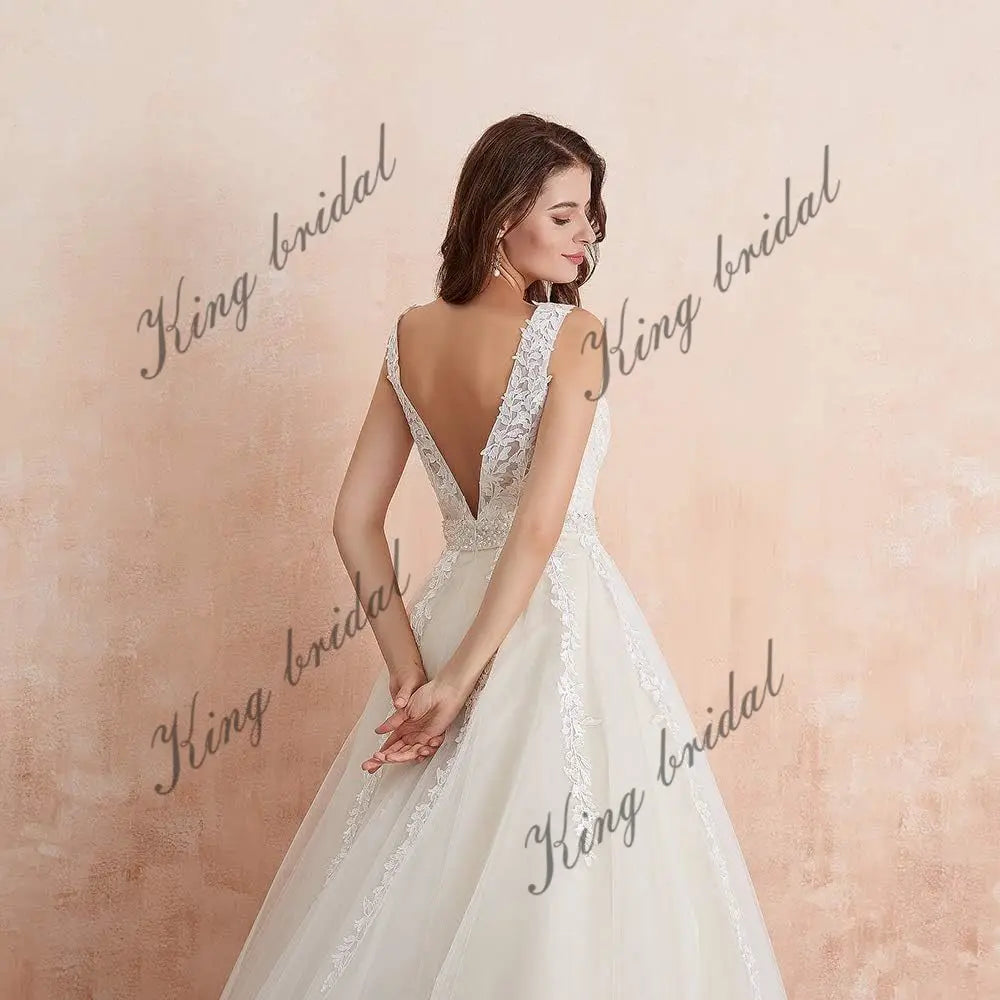 Women's Tulle Floor Length A Line Wedding Dress for Bride Lace Applique Evening Dress V Neck Straps Ball Gowns