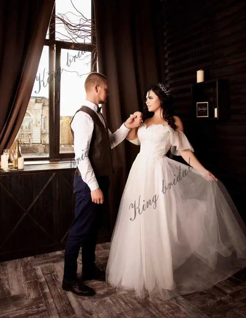 Elfenbeinfarbenes Tüll-A-Linien-Boho-Hochzeitskleid Modernes Korsett-Brautballkleid Individuelle einzigartige Strandhochzeitskleider für Frauen 2025 Braut 