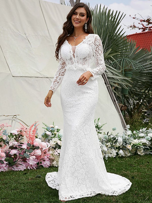 Vestidos de novia con escote en V, mangas largas, encaje, flores hechas a mano y cola larga.