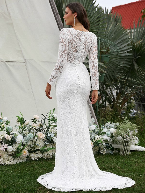 Vestidos de novia con escote en V, mangas largas, encaje, flores hechas a mano y cola larga.