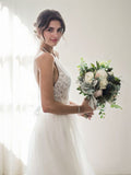 Vestidos de novia de corte A/princesa, de tul, sin mangas, con escote halter y largo hasta el suelo.