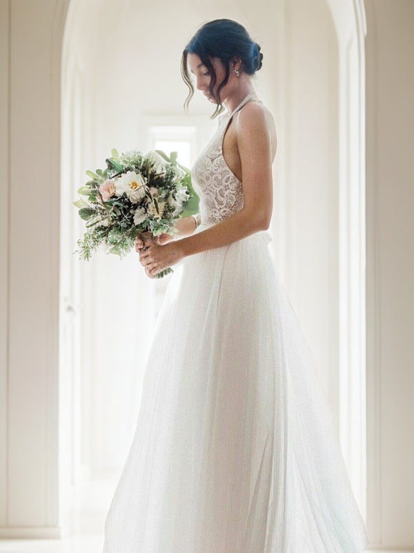 Vestidos de novia de corte A/princesa, de tul, sin mangas, con escote halter y largo hasta el suelo.