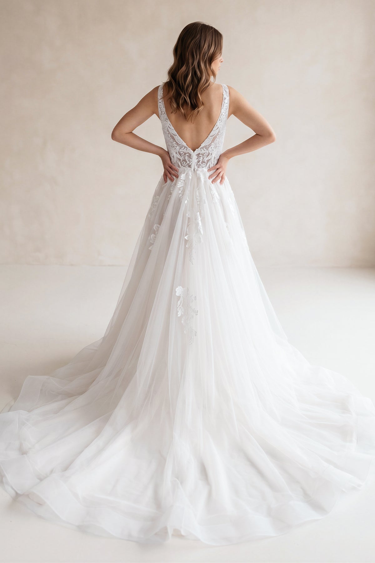 Ivory A-Line Deep V-Neck Backless Long Wedding Dress with Lace