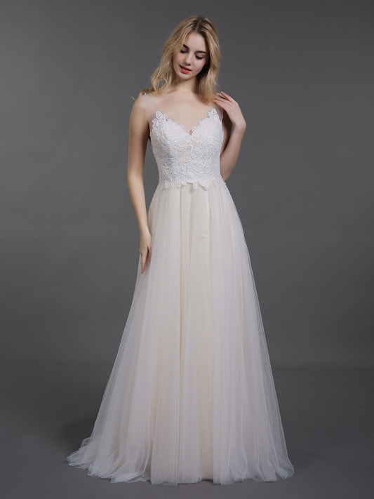 Vestido de novia con cola larga y corpiño de encaje y falda de tul - Vestidos de novia color champán