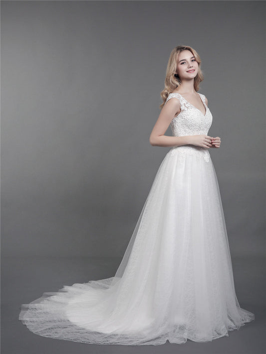 Vestido de novia de encaje con tirantes y cola - Vestidos de novia color marfil