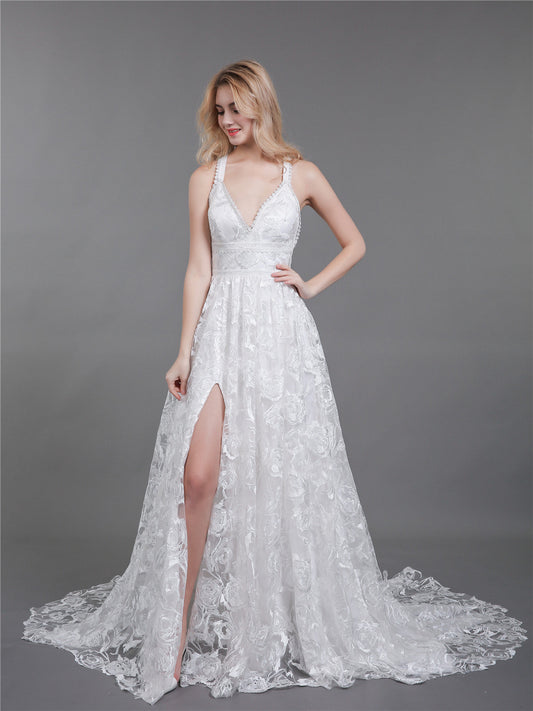 Brautkleid aus Spitze mit Schlitz und tiefem Rückenausschnitt – Elfenbeinfarben