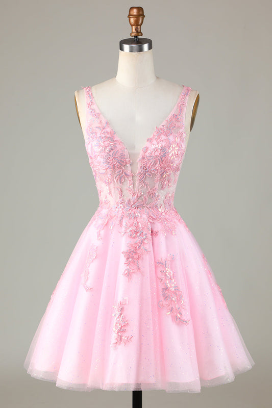 Vestido rosa brillante para fiesta de bienvenida con apliques de lentejuelas, ideal para cócteles y graduaciones.